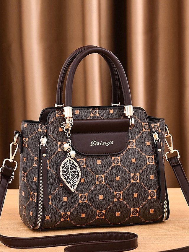 Elegant Women’s Faux Leather Handbag with Red Accents